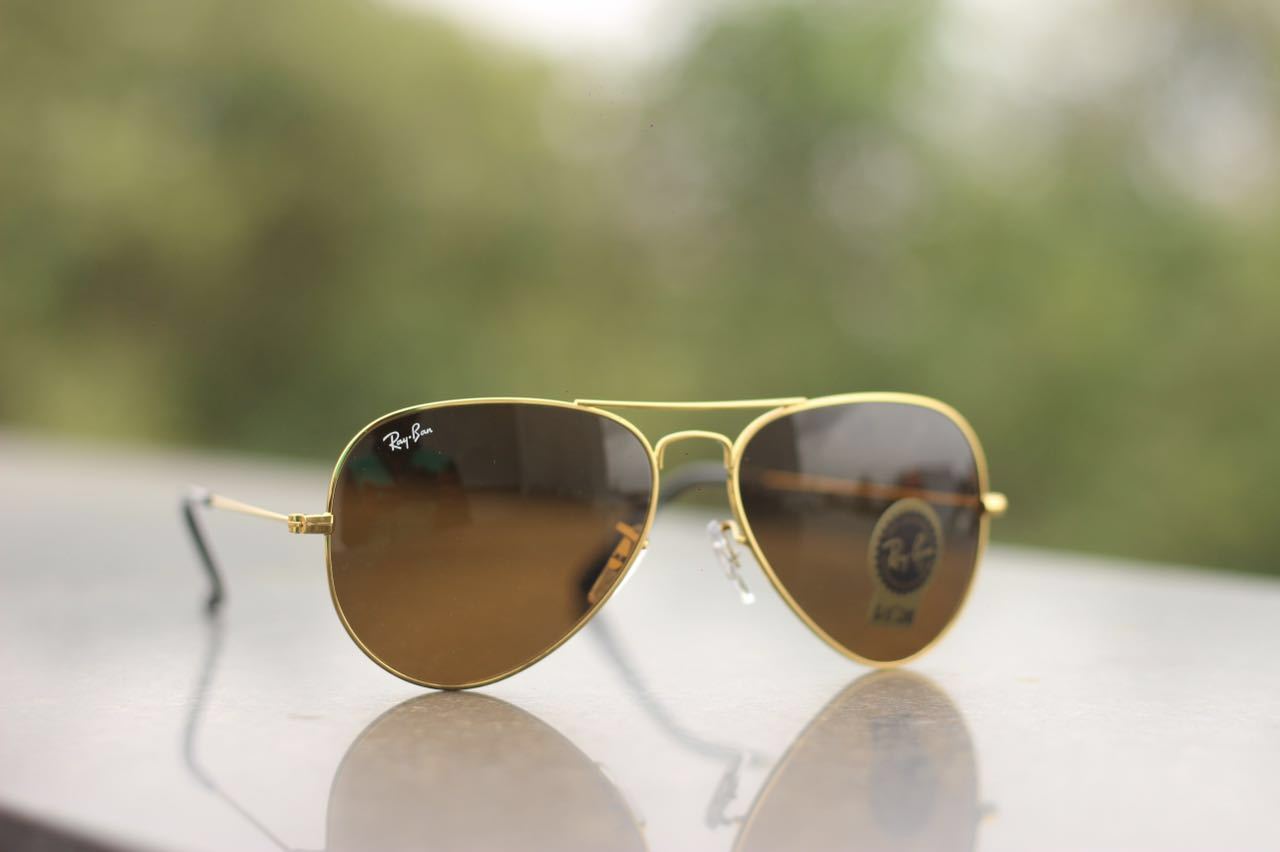 All Season Special Trending Slant Fashionable Sunlight Eye Protected Hot Favourite Sunglasses For Unisex.